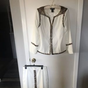 A white skirt and jacket with leopard trim